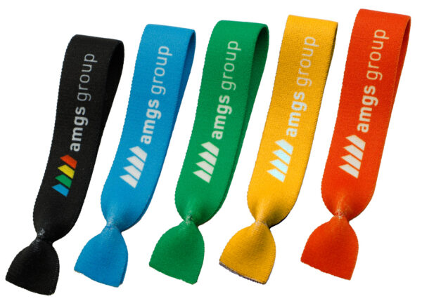 Set of promotional twistband hair ties in different colors with AMGS Group logo.