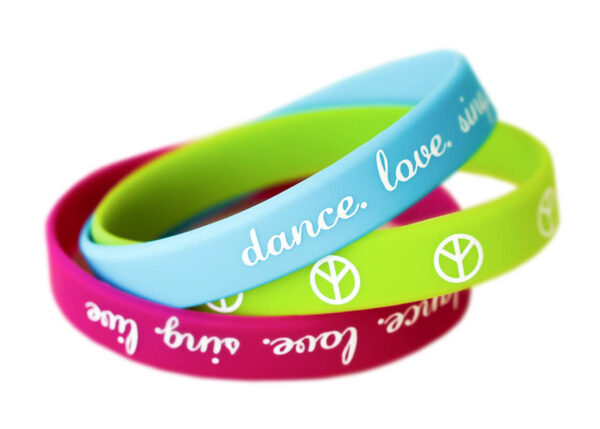 Personalized silicone wristbands with prints in various colors. From AMGS Group.