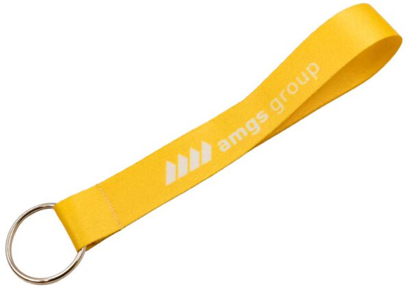 A custom short polyester keychain with a yellow sublimation print for attaching keys. Fully personalized by AMGS Group.