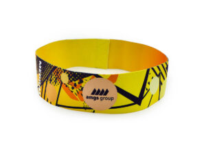 Yellow sublimated fitness resistance band with AMGS GROUP logo and medium tension level.