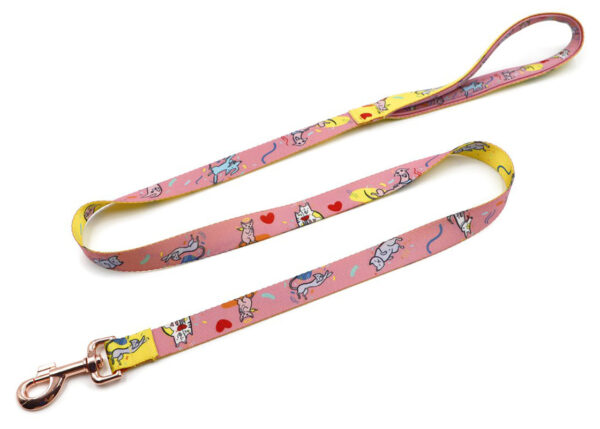 Close-up of a sublimated pet leash with colorful cartoon illustrations and detailed stitching.