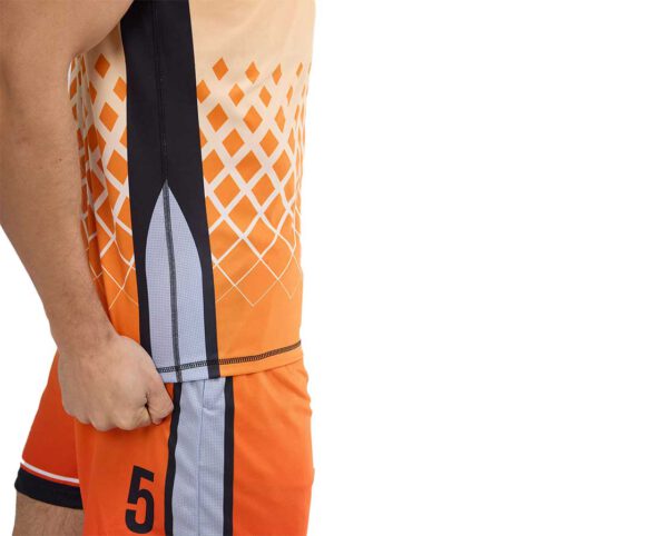 Side view of the men’s Sport Elastic T-shirt – orange and black color scheme with white geometric sublimation print and contrasting inserts. Made of breathable, elastic fabric. Available at AMGS Group.