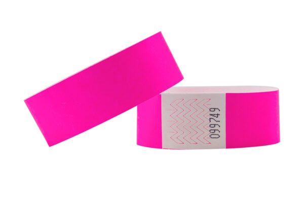 Neon pink Tyvek wristband, 25mm. Wide band perfect for concerts and festivals. Manufacturer AMGS Group.