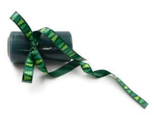 Dark green wine bottle tied with a double-sided sublimation satin ribbon featuring a green tree pattern (Design 2). Manufacturer AMGS Group.